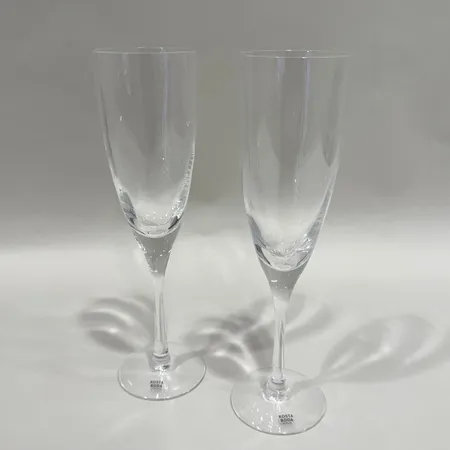 2 Champangeglas, "Chetau", Bertil Vallien för Kosta Boda, höjd: 22cm, Ø60mm, originalkartong.