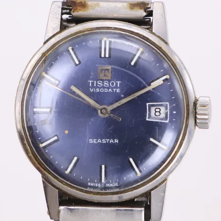 Herrur, Tissot Seastar Visodate, stål, 34mm, manuell, mörkblå urtavla, datum (återställer ej korrekt), plexiglas med repor, länk i stål med slitage, inga tillbehör 