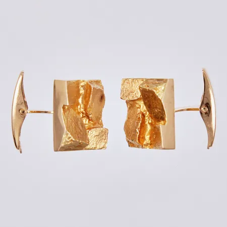 Ett par manschettknappar, längd ca 1,4cm, bredd ca 16mm, OÖG, 18K Vikt: 11,8 g