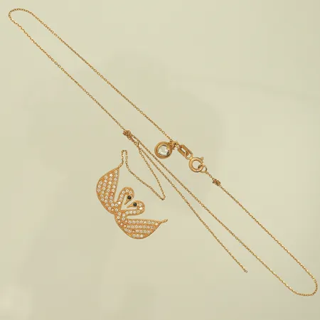 Halscollier med vita och svarta stenar, gått av i länken, stenar saknas, 21K, 3,7g Vikt: 3,7 g