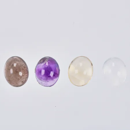 Månsten ca 3,26ct, Ametist ca 3,53ct, Rökkvarts ca 3,80ct och Citrin ca 3,38ct