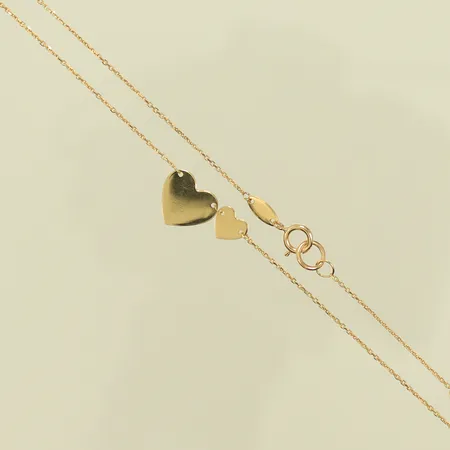 Halskedja med integrerat hänge, längd 46,5mm, bredd 1-9mm, 18K, 1,9g Vikt: 1,9 g