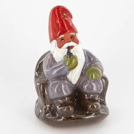Figurin, Tomte i gungstol med pipa, design Rolf Berg, Torshälla Sweden, höjd ca 16 cm, etikettmärkt Skickas med paket.