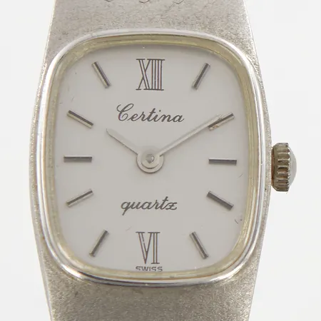 Damur Certina 16mm, innermått 13cm, bredd: 7-19mm, originalspänne,  batteribyte, vitguld 18K 