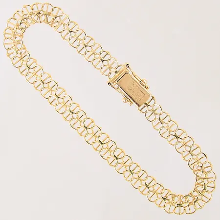 Armband X-länk med stav, längd 18,5cm, bredd 7mm, GHA, vissa länkbitar med mindre skevheter, 18K  Vikt: 6,8 g