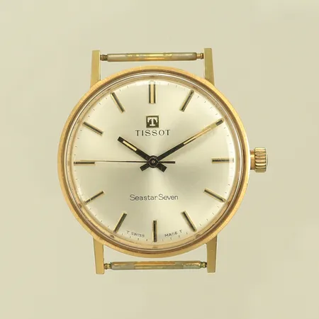 Herrur Tissot, Seastar seven, 18K, Ø 33mm, gravyr, 26,2g bruttovikt 