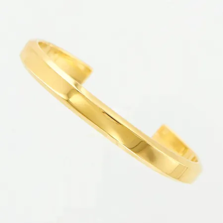 Armband stelt öppen modell, Skultuna Icon Coff,  innermått 12cm, bredd: 7mm, guldpläterat stål, smyckespåse, originalask medföljer Vikt: 0 g