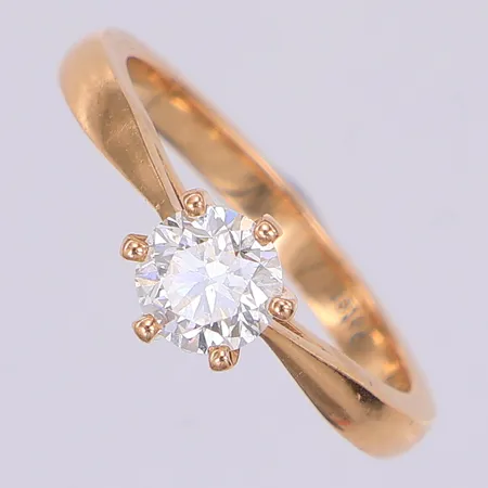 Ring, diamant 1 x 0,70ct W(H)Si, stl 16¾, Uziel, gravyr, 18K, intyg från Fritz Olsson Vikt: 3,7 g
