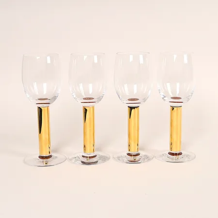 Fyra rödvinsglas, Nobel, Gunnar Cyrén för Orrefors, höjd ca 18cm, obetydligt slitage, originalkartonger. Skickas med postpaket.