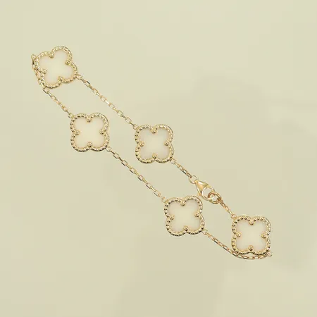 Armband med vita stenar, längd 17,5cm, bredd 2-13mm, 14K, 7,2g brutto 