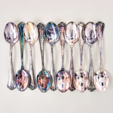 Kaffeskedar, tio stycken, längd 11cm, något oxiderade, silver 830/1000 Vikt: 127,1 g