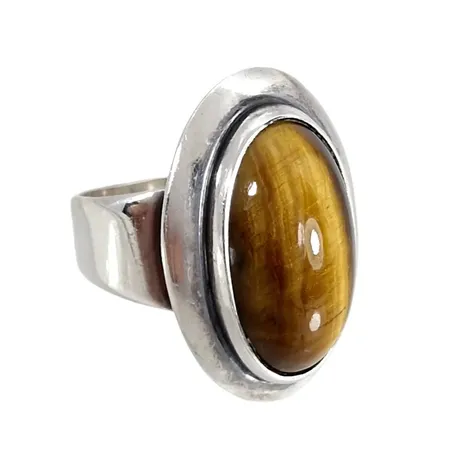 Ring Danmark, silver 925/1000, Niels Erik From Danmark, Tigeröga, Ø17,0 mm, bredd 4-22 mm, sten utan anmärkning, fint skick Vikt: 5,3 g