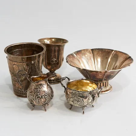 Skål på fot 8cm, Ø16cm, bägare på fot 11cm, Ø8cm bägare 11,5cm, 10cm, bucklig, gräddkanna ca8cm, sockerskål 5cm Ø7cm, silver 830/1000 Vikt: 729,4 g