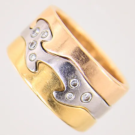 Ring Georg Jensen Fusion, design Nina Koppel, Danmark, trefärgad, med diamanter 3 x ca 0,03ct, 3 x ca 0,01ct, 2 x ca 0,02ct, stl 53/17½, bredd 11mm, minimala ytliga bruksrepor, påse, två stycken informationsblad, dustbag Vikt: 15,8 g