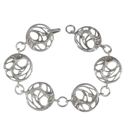 Armband FINLAND, silver 925/1000, "Spiderweb", KARL LAINE - FINLAND 1973, längd 20 cm, bredd dekor 21 mm, fint skick, svensk kontroll/importstämpel Vikt: 17,8 g