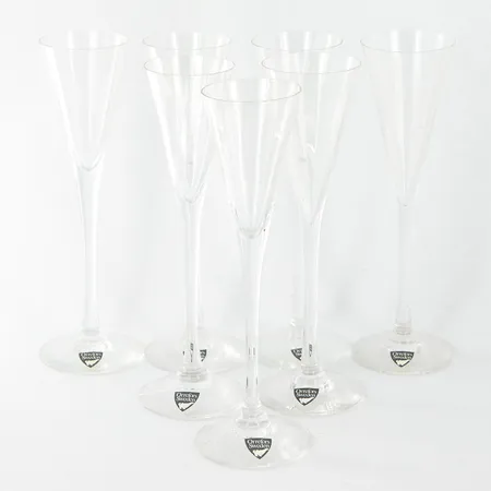  Sju snapsglas ur serien Optica, Gunnar Cyrén för Orrefors, höjd: 17cm, grå etikett,  Skickas med paket.