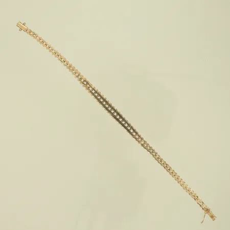 Armband doserad, längd 19cm, bredd 4-6,5mm, 14K, 9,9g Vikt: 9,9 g
