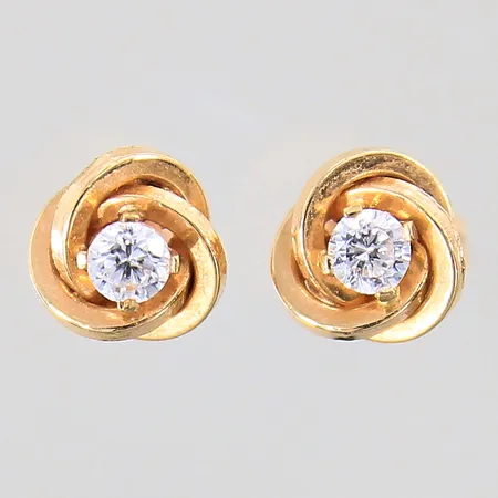 Ett par örhängen med vita stenar, Ø7mm, 18K Vikt: 0,8 g