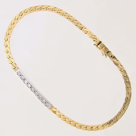 Armband med diamanter 9 x ca 0,02-0,03ct, längd 19,5cm, bredd 3-3,4mm, tvåfärgat, 18K Vikt: 8,2 g
