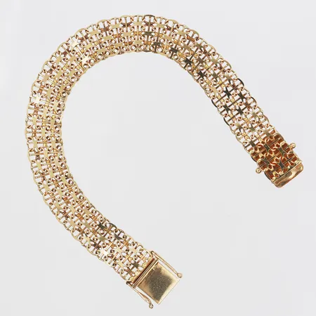 Armband, X-länk med stav, N S E Guldvaraktiebolag, Köping år 1984, längd: 18,5 cm, bredd: 11,5 mm, smärre ojämnheter, 18K guld. Vikt: 14,8 g