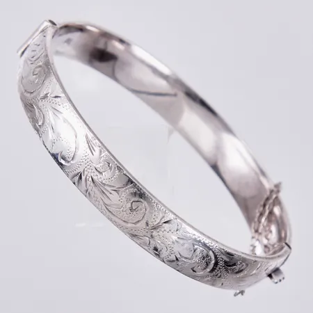 Stel armring, inner Ø ca 60mm, öppningsbart med säkerhetskedja, bredd: ca 9mm, engelska stämplar, 925/1000, silver Vikt: 16,8 g