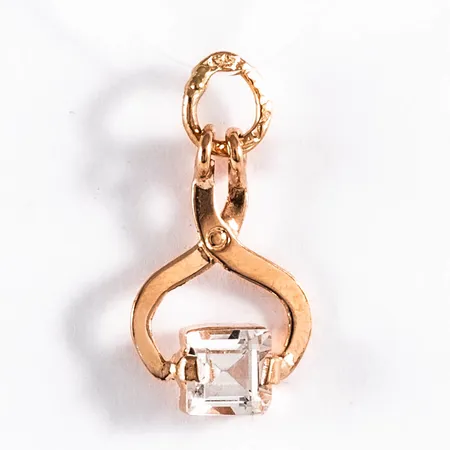 Hänge "sockertång" i 18K guld med en bergkristall. Det är 17 mm långt inkl. ögla och väger 0,5g.