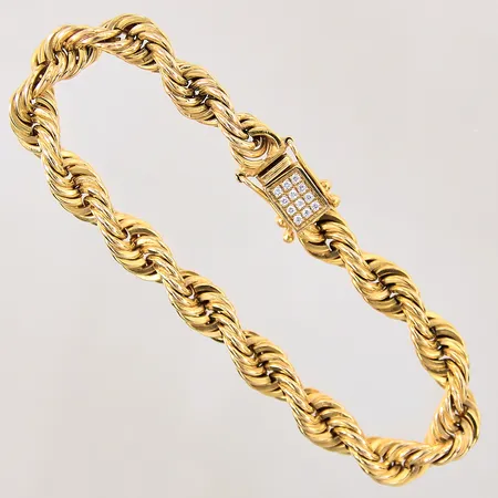 Armband Cordell med diamanter 12 x ca 0,01ct, längd 19,5cm, bredd 7,5mm, 18K Vikt: 43,6 g