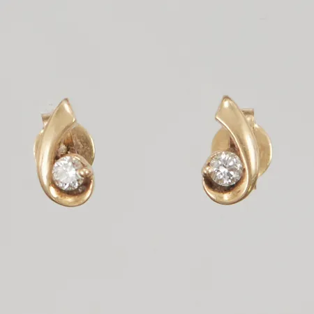 Ett par örhängen, diamanter 2x ca 0,03ct, 7mm, stift, 18K 1,1g.