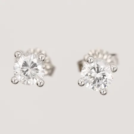 Ett par örhängen med vita stenar, höjd: 5 mm, bredd: 5 mm, 14K vitguld. Vikt: 1,2 g