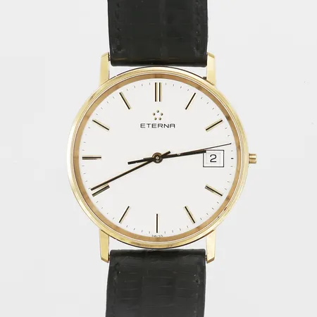 Herrur Eterna, quartz, 14K guld, datum, Ø35mm, originalspänne, går ej/behov av batteribyte, saknar kronan, slitage, gravyr, repor, inga övriga tillbehör. Vikt: 0 g