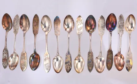 12 Kaffeskedar, modell Tornedal, 12cm, gravyr, 830/1000 silver Vikt: 192,2 g