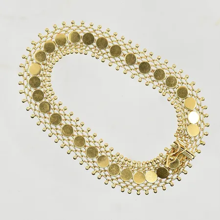 Armband, längd, 19½ cm, bredd 12 mm, ojämn/skev länk, 18K. Vikt: 16,6 g