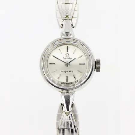 Damur Omega Ladymatic, stål, manuell, Ø17mm, verk nr 19745846, caliber 661, boett nr 551005, fungerar vid testtillfälle, stållänk omärkt, 16cm, inga tillbehör.