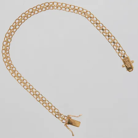 Armband X-länk, längd 18cm, bredd 5mm, T. Clareus, Stockholm 1976, 18K Vikt: 5,4 g