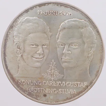 Minnesmynt Konung Carl XVI Gustaf, Drottning Silvia, 19 juni 1976, Ø36mm, nominellt värde 50kr, silver 925/1000 Vikt: 27,1 g