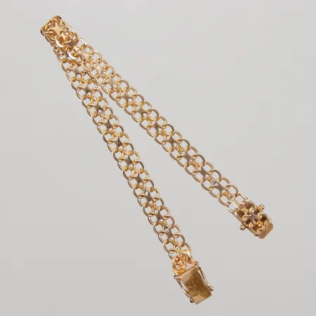 Armband X-länk, ca 16,5cm, bredd ca 6,4mm, något skadad länkbit vid låset, MGT år 1965, 18K Vikt: 9,1 g