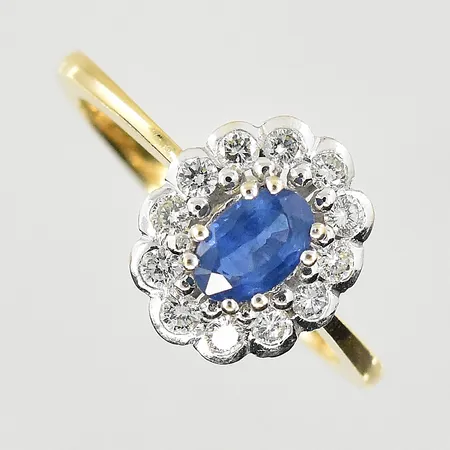 Carmoséring med blå safir samt diamanter 0,24ctv, stl 17, bredd 2-11 mm, gulguld/vitguld, 18K. Vikt: 3,3 g