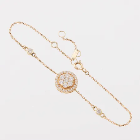 Armband med stenar, längd ca 18 cm, bredd 0.7-10.8 mm, 18k. Vikt: 2,8 g