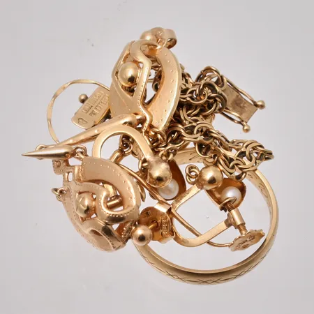 Diverse defekt guld, 18K, vikt 14,76g.