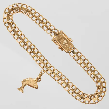 Armband X-länk, berlock Nefertiti,  längd ca 19cm, bredd 6,5-28mm, slitage, böjda länkar, 18K Vikt: 10,5 g