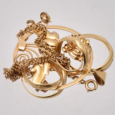 Diverse defekt guld, 18K, vikt 10,67g.
