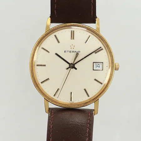 Armbandsur Eterna, 33mm, quartz, datum, boett i 18K, boettnummer: 158.2141.68, läderband, gravyr, repig, batteribyte krävs, inga tillbehör