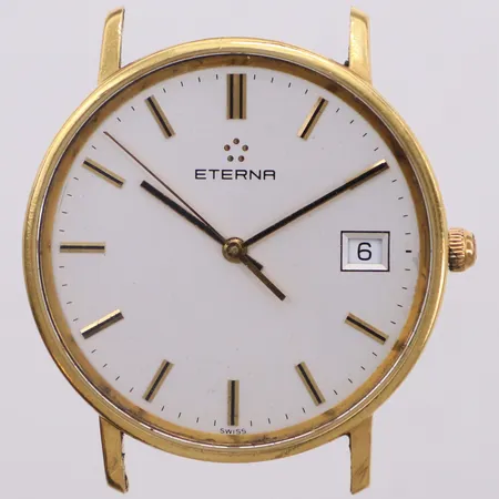 Herrur, Eterna, 18K, quartz (går ej), 33,5mm, datum, boettnr 4100.68, buckla, saknar armband, inga tillbehör, brv: 18,8g
