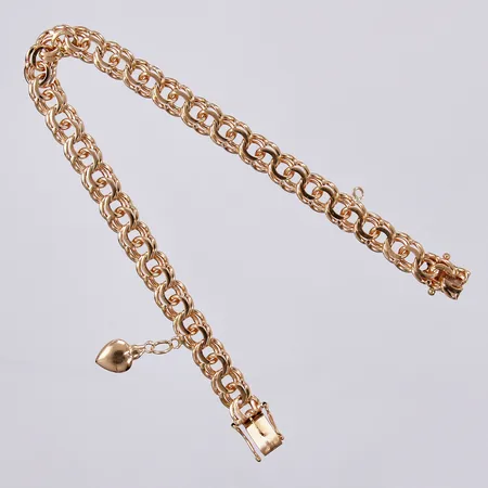 Armband Bismarck med en berlock, längd: ca 20,5cm, bredd: ca 7mm, BRG, Bg:S Guld Bernt Gottschalk, Skärholmen, år 1964, 18K  Vikt: 20,6 g