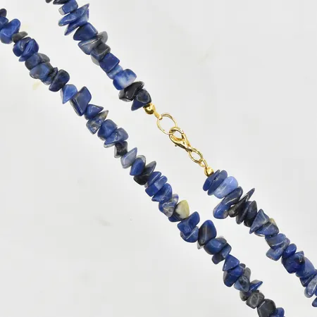 Collier, tumlade Lapiz Lazuli, längd 41 cm, bredd ca 10-15 mm, lås i metall. Vikt: 0 g
