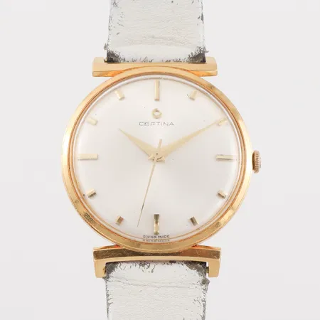 Herrur Certina, tickar igång men ej funktionstestad, diameter ca 33.2 mm, refnr 4110 028 snr 472500 med läderband, 18k.