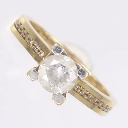 Ring med vita stenar, stl 17¼, bredd 2,5-7mm, 14K Bruttovikt: 3,8g 