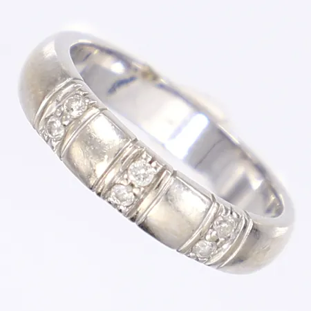Ring med diamanter tot 6xca 0,01ct, stl 17¼, bredd 4mm, GHA, vitguld, repig, 18K Vikt: 4,5 g