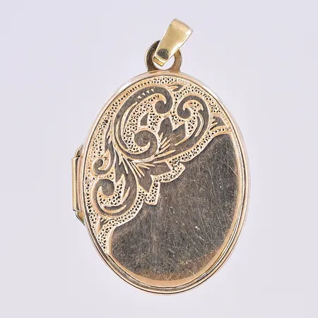Hänge medaljong, längd 28 mm, bredd 17 mm, 18K. Vikt: 2,4 g