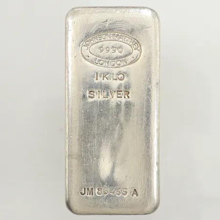 Silvertacka, Johnson Matthey, London, snr:JM83465A, längd 11cm, bredd 53,5mm, repig, silver 999/1000 Vikt: 999,1 g